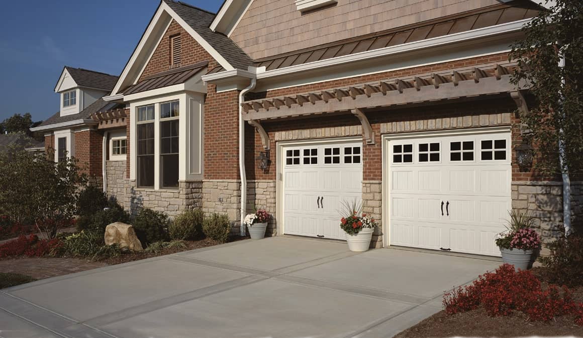 white garage doors with windows