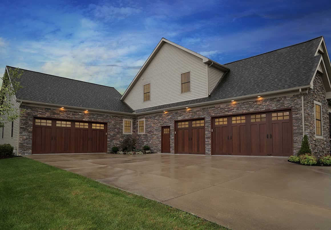 house with brown garage doors, overlay, wooden