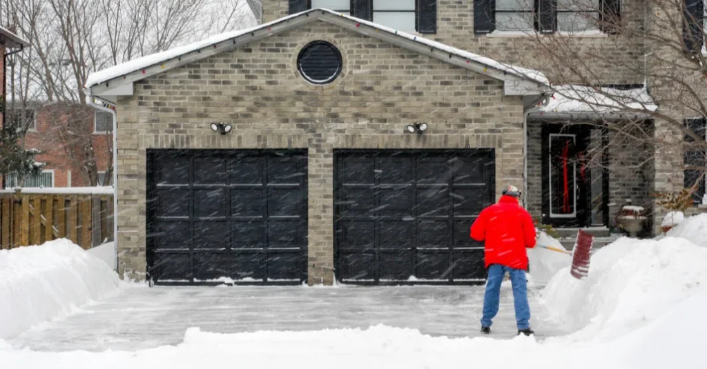 Essential Tips to Stop Your Garage Door from Freezing This Winter 1 frozen garage door