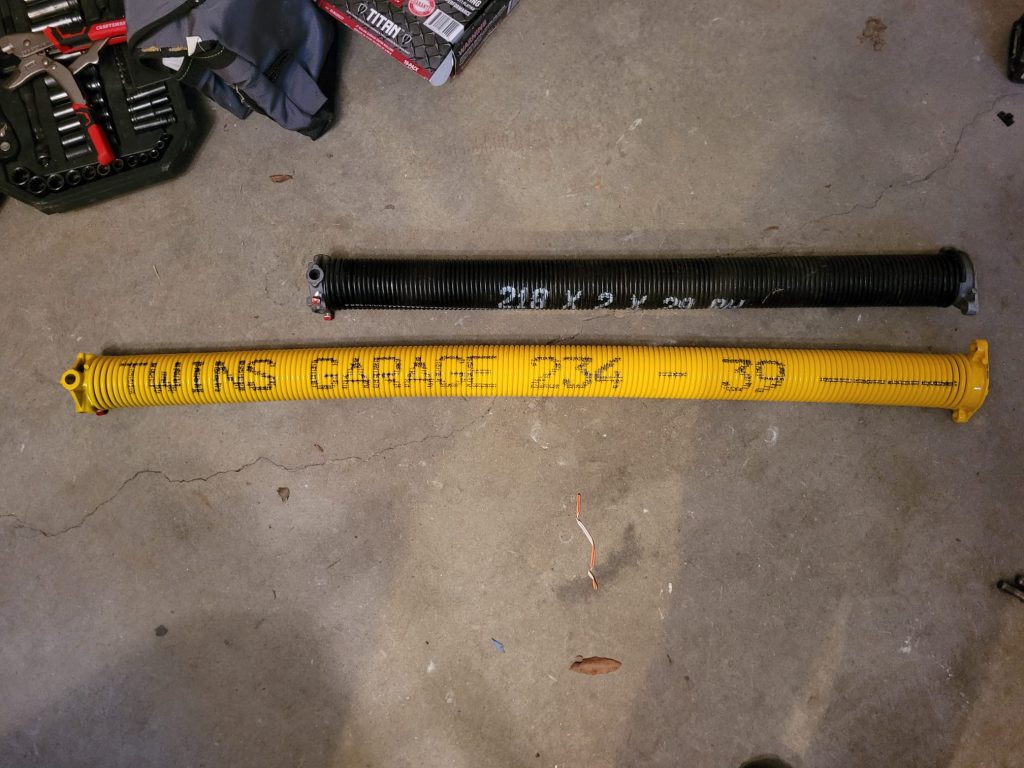 How Long Do Garage Door Parts Last? 1 duramaster twins garage doors springs vs a standard torsion spring of the same fit